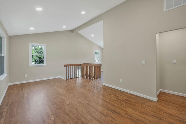 12 Bay Ave, Lake Ronkonkoma, NY 11779 - unfurnished living room with healthy amount of natural light, wood finished floors, and recessed lighting