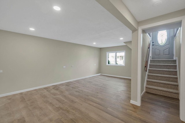 12 Bay Ave, Lake Ronkonkoma, NY 11779 - below grade area featuring stairway, wood finished floors, and recessed lighting