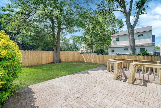 12 Bay Ave, Lake Ronkonkoma, NY 11779 - fenced backyard with a patio