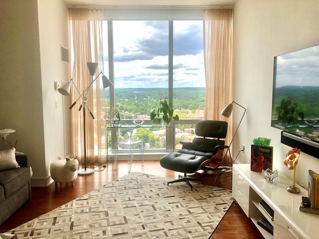 5 Renaissance Sq Unit Ph6C, White Plains, NY 10601 - sitting room with a wall of windows, wood finished floors, and plenty of natural light