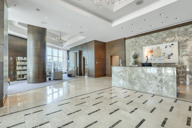 5 Renaissance Sq Unit Ph6C, White Plains, NY 10601 - reception area featuring a chandelier, recessed lighting, and a high ceiling