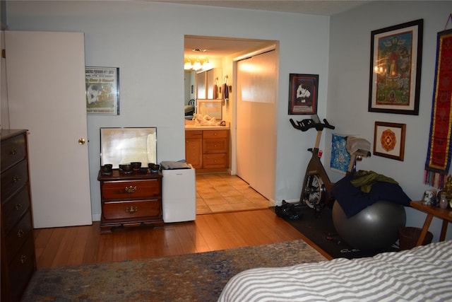 3905 Wild Berry Ct Unit 6C, Poughkeepsie, NY 12603 - bedroom featuring wood finished floors and connected bathroom