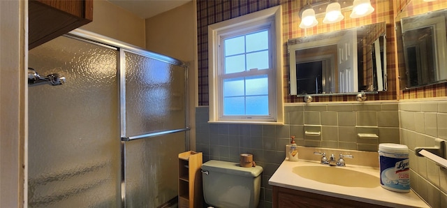 76 Gooseberry Rd, Mastic Beach, NY 11951 - full bath with a shower stall, vanity, wallpapered walls, tile walls, and wainscoting
