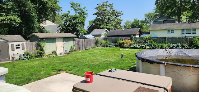 76 Gooseberry Rd, Mastic Beach, NY 11951 - fenced backyard with a storage shed, a residential view, and a patio