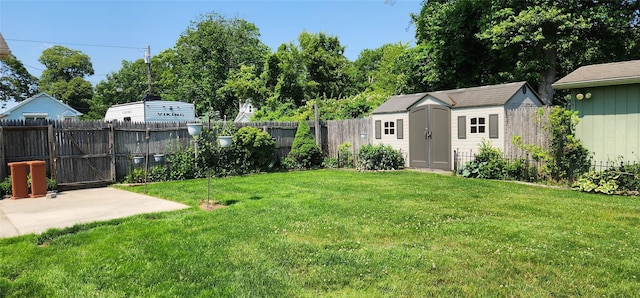 76 Gooseberry Rd, Mastic Beach, NY 11951 - fenced backyard with a storage shed and a patio area