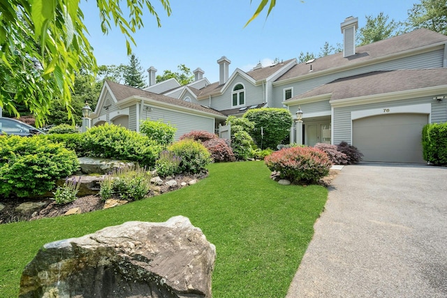 76 Boulder Ridge Rd, Scarsdale, NY 10583 - view of front of home featuring a garage, a front lawn, and driveway