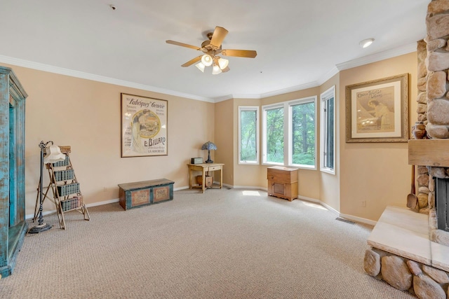 76 Boulder Ridge Rd, Scarsdale, NY 10583 - sitting room featuring ceiling fan, ornamental molding, carpet floors, and a fireplace
