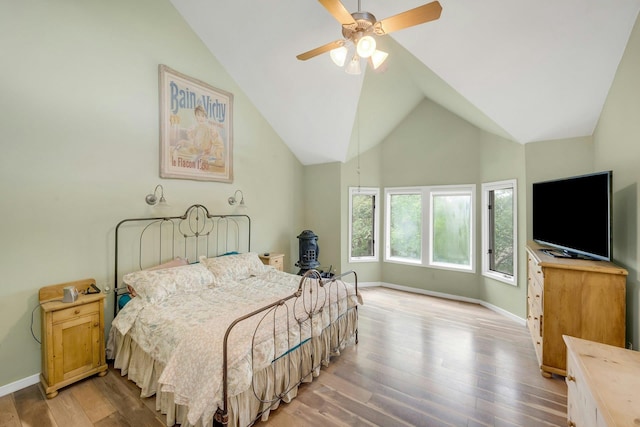 76 Boulder Ridge Rd, Scarsdale, NY 10583 - bedroom featuring vaulted ceiling, light wood-style flooring, and ceiling fan