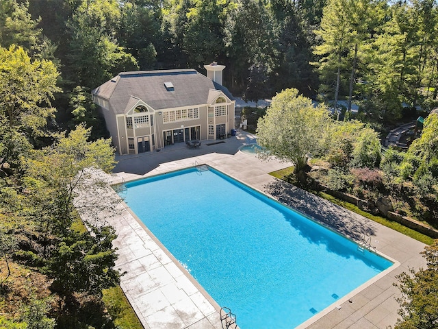 76 Boulder Ridge Rd, Scarsdale, NY 10583 - outdoor pool featuring a patio