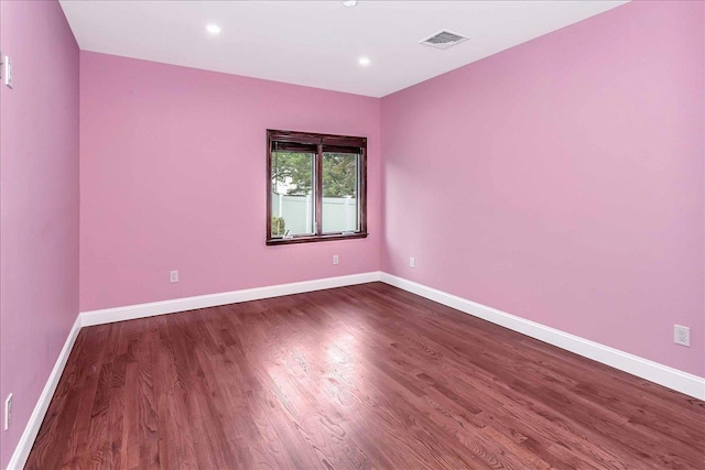165 Wheeler Ave, Valley Stream, NY 11580 - unfurnished room featuring dark wood finished floors and recessed lighting
