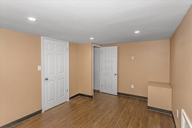 165 Wheeler Ave, Valley Stream, NY 11580 - unfurnished room with wood finished floors and recessed lighting