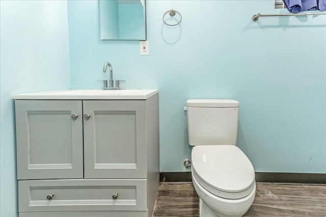165 Wheeler Ave, Valley Stream, NY 11580 - half bathroom with vanity and wood finished floors