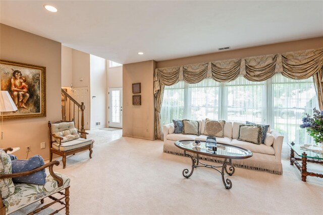 166 Country Club Dr Unit 166, Commack, NY 11725 - carpeted living area with stairway and recessed lighting