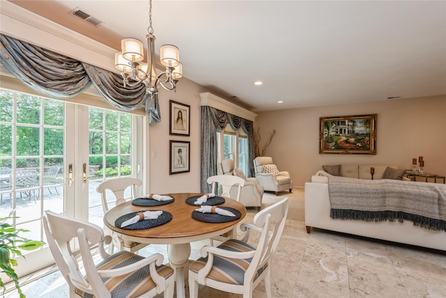 166 Country Club Dr Unit 166, Commack, NY 11725 - dining room with a chandelier, french doors, light stone finish floors, and recessed lighting