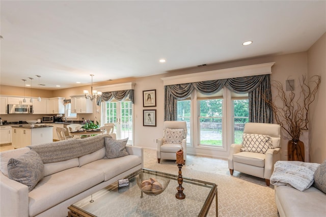 166 Country Club Dr Unit 166, Commack, NY 11725 - living room with a chandelier, recessed lighting, and light carpet