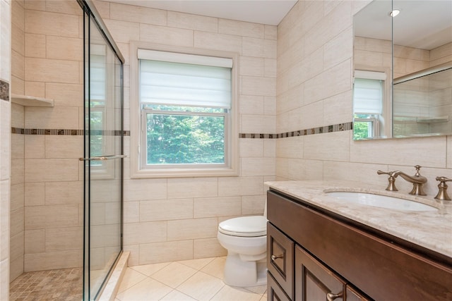 166 Country Club Dr Unit 166, Commack, NY 11725 - bathroom with tile walls, vanity, a shower stall, and tile patterned floors