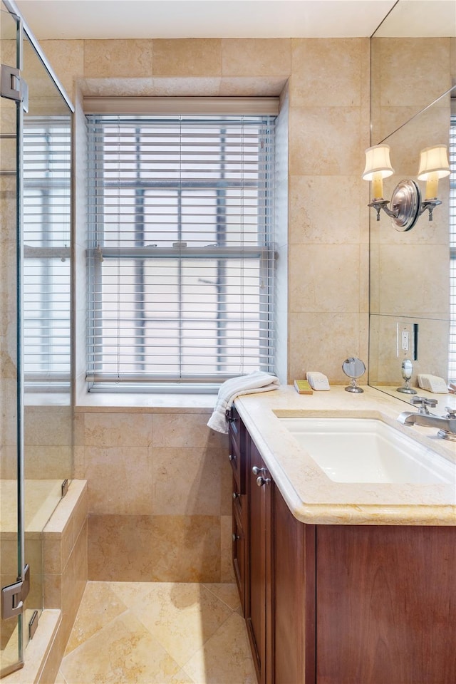 3001 Henry Hudson Pkwy Unit 1Fg, Bronx, NY 10463 - full bath featuring vanity, a stall shower, tile walls, and tile patterned floors