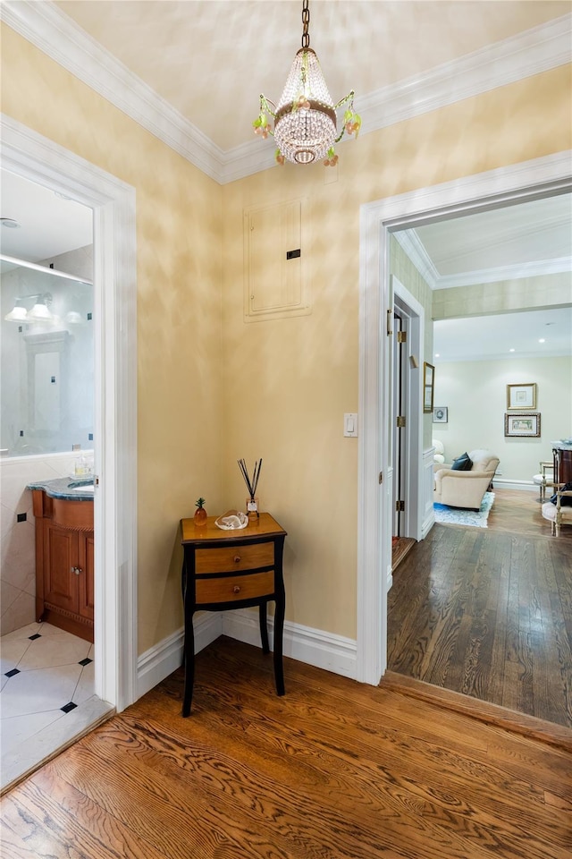 3001 Henry Hudson Pkwy Unit 1Fg, Bronx, NY 10463 - corridor featuring a chandelier, wood finished floors, and crown molding