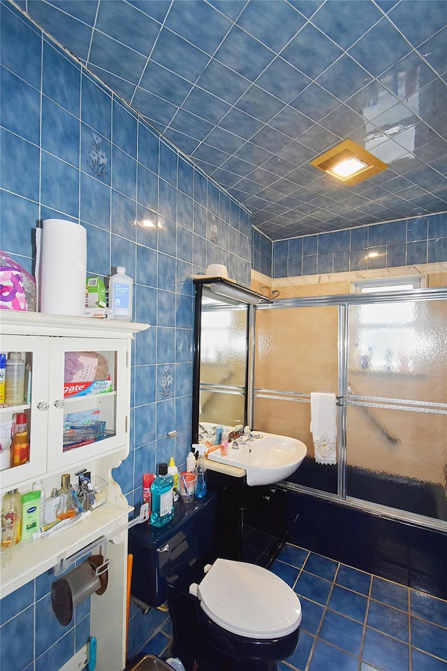 517 Westchester Ave, Mount Vernon, NY 10552 - full bathroom with tile patterned flooring, tile walls, and a shower stall