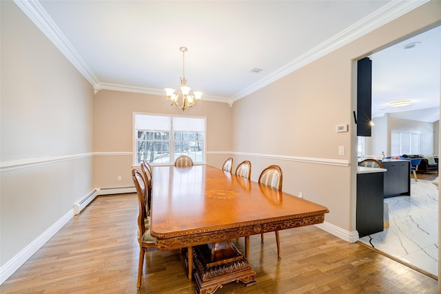 83 N Airmont Rd, Suffern, NY 10901 - dining room featuring a chandelier, ornamental molding, light wood-style flooring, and a baseboard radiator