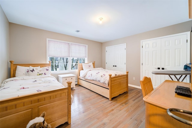 83 N Airmont Rd, Suffern, NY 10901 - bedroom with light wood finished floors and multiple closets