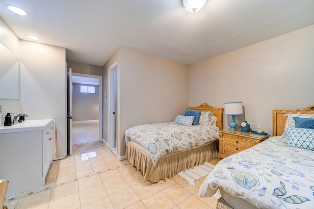 83 N Airmont Rd, Suffern, NY 10901 - bedroom with light tile patterned floors and recessed lighting
