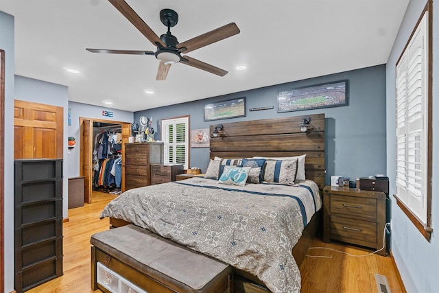 9 Schnabl Ct, Wappingers Falls, NY 12590 - bedroom featuring light wood-type flooring, a spacious closet, a closet, a ceiling fan, and recessed lighting