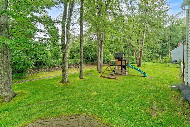 9 Schnabl Ct, Wappingers Falls, NY 12590 - view of grassy yard with a playground