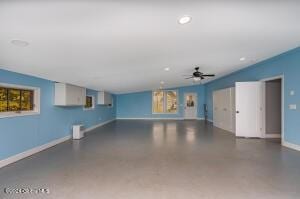 138 Lydon Ln, Hannacroix, NY 12124 - garage with ceiling fan and baseboards