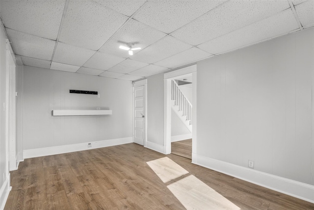 5 Putnam Ter, Brewster, NY 10509 - finished basement featuring wood finished floors, a paneled ceiling, and stairway