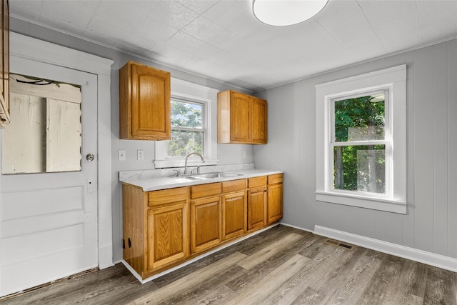 5 Putnam Ter, Brewster, NY 10509 - kitchen with light countertops, dark wood finished floors, and brown cabinets
