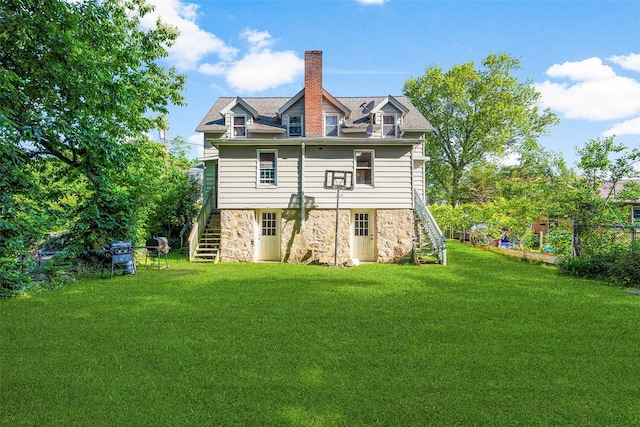 5 Putnam Ter, Brewster, NY 10509 - rear view of property with stairs, a chimney, and stone siding