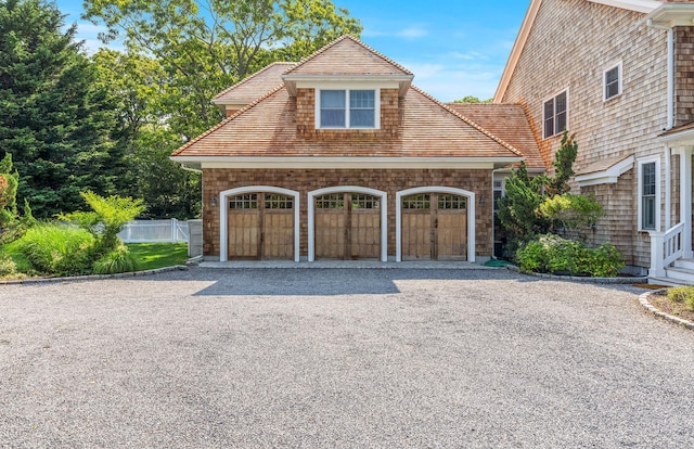 1 Simon Ct, Quogue, NY 11959 - garage with gravel driveway
