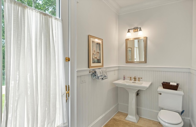 1 Simon Ct, Quogue, NY 11959 - bathroom with wainscoting and crown molding