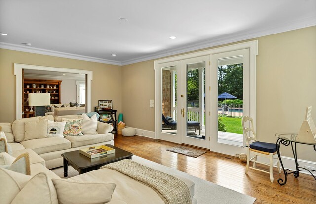 1 Simon Ct, Quogue, NY 11959 - living room featuring french doors, ornamental molding, wood finished floors, and recessed lighting