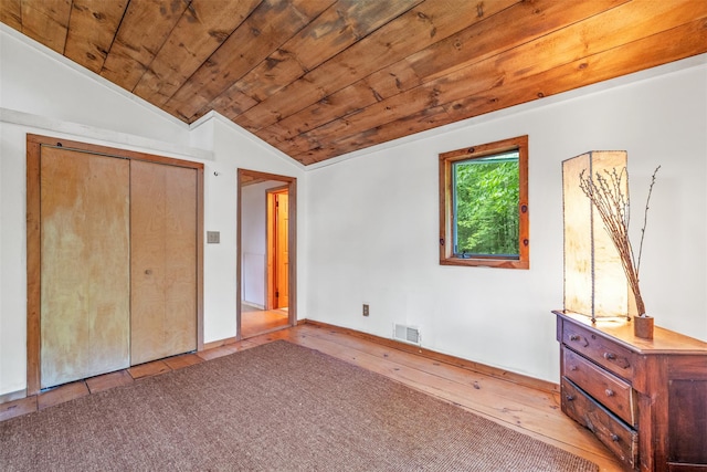 30 Hallenbach Rd, Glen Spey, NY 12737 - unfurnished bedroom featuring vaulted ceiling, wood ceiling, wood-type flooring, and a closet