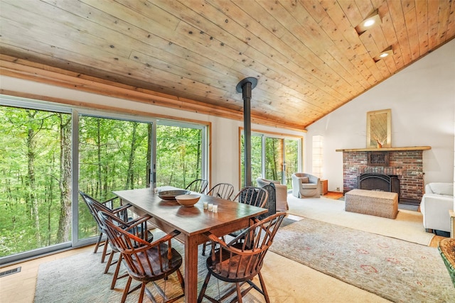 30 Hallenbach Rd, Glen Spey, NY 12737 - dining area featuring lofted ceiling, wooden ceiling, a fireplace, and recessed lighting