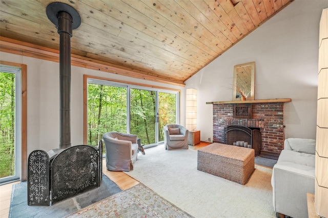 30 Hallenbach Rd, Glen Spey, NY 12737 - living area with vaulted ceiling, wooden ceiling, wood finished floors, and a fireplace
