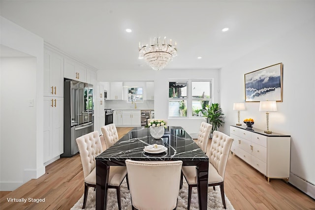 13015 Sutter Ave, South Ozone Park, NY 11420 - dining area with a chandelier, light wood finished floors, recessed lighting, and beverage cooler