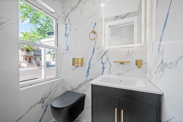 13015 Sutter Ave, South Ozone Park, NY 11420 - bathroom with vanity, plenty of natural light, and tile walls