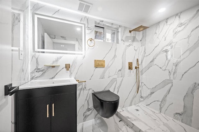 13015 Sutter Ave, South Ozone Park, NY 11420 - full bathroom featuring a marble finish shower and vanity