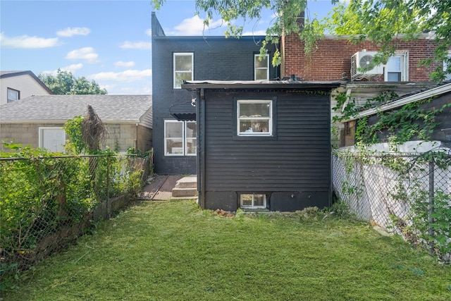 13015 Sutter Ave, South Ozone Park, NY 11420 - rear view of property with a fenced backyard