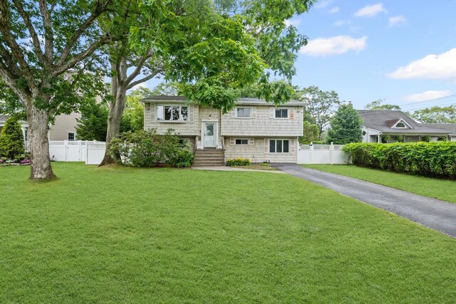 1291 Minerva Ave, West Islip, NY 11795 - bi-level home featuring asphalt driveway