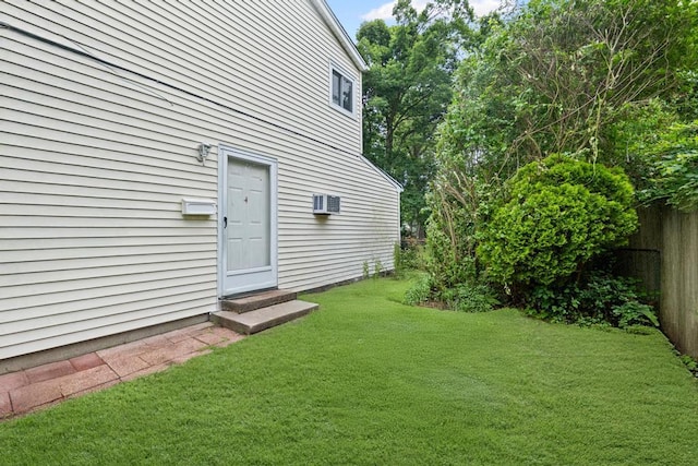 1291 Minerva Ave, West Islip, NY 11795 - view of yard featuring entry steps and an AC wall unit