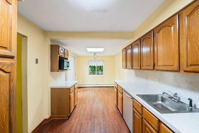 1291 Minerva Ave, West Islip, NY 11795 - kitchen with stainless steel dishwasher, a baseboard radiator, dark wood-type flooring, and brown cabinets