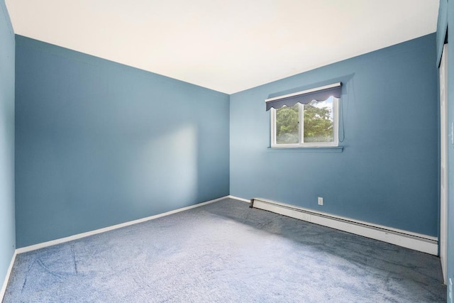 1291 Minerva Ave, West Islip, NY 11795 - unfurnished room featuring a baseboard heating unit and carpet