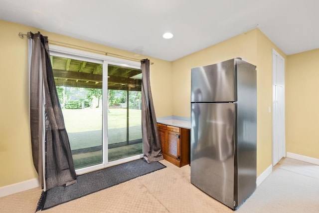 1291 Minerva Ave, West Islip, NY 11795 - kitchen featuring freestanding refrigerator, carpet, and recessed lighting