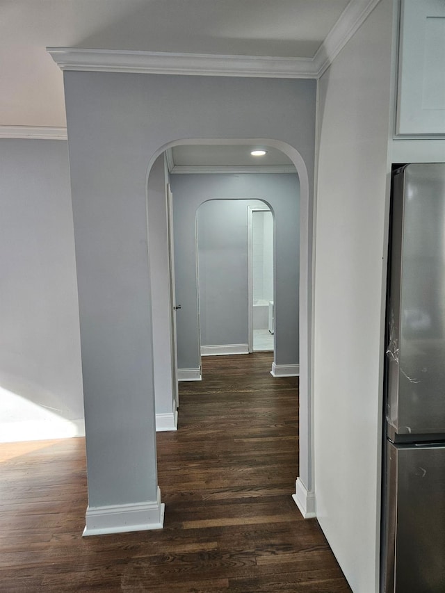 300 Richbell Rd Unit B2, Mamaroneck, NY 10543 - hallway featuring crown molding, wood finished floors, and arched walkways