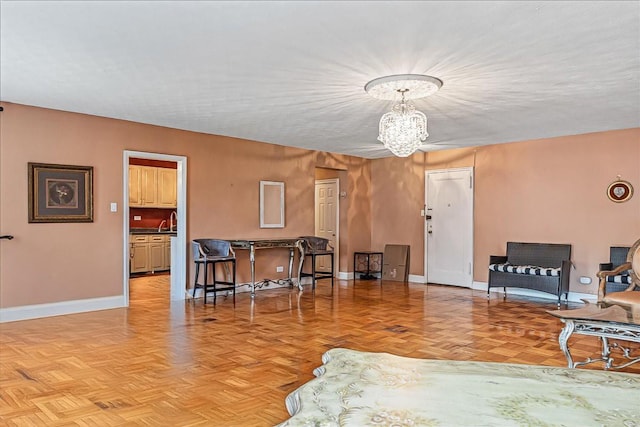 162-01 Powells Cove Blvd Unit 1J, Beechhurst, NY 11357 - living room featuring a chandelier and baseboards