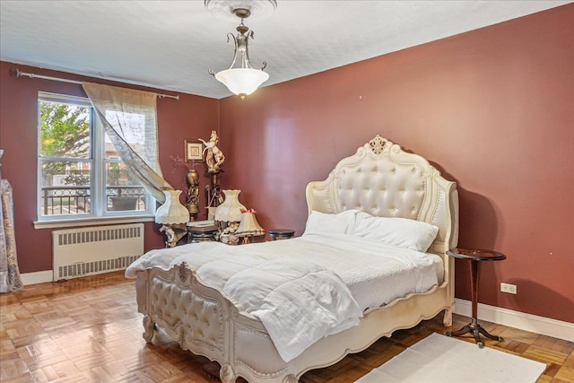 162-01 Powells Cove Blvd Unit 1J, Beechhurst, NY 11357 - bedroom with radiator heating unit and baseboards